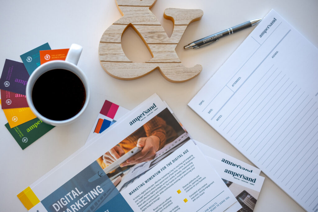 variety of print assets created during a rebranding overhaul