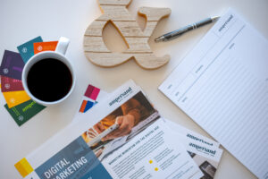 variety of print assets created during a rebranding overhaul